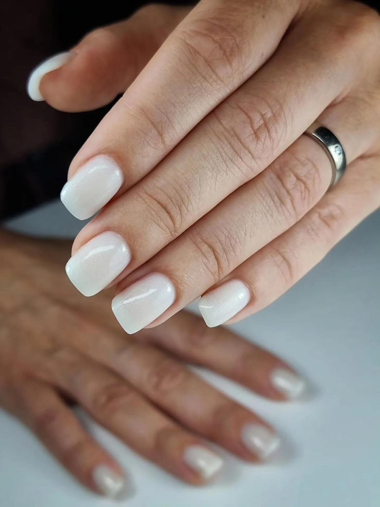 Short milky white gel nails, freshly done